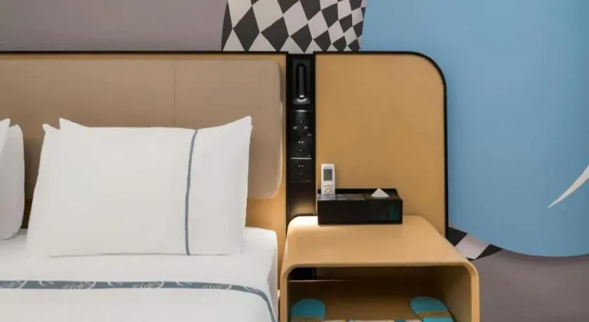 Bed in City Comfort Inn Huanggang Wuxue Bus Center