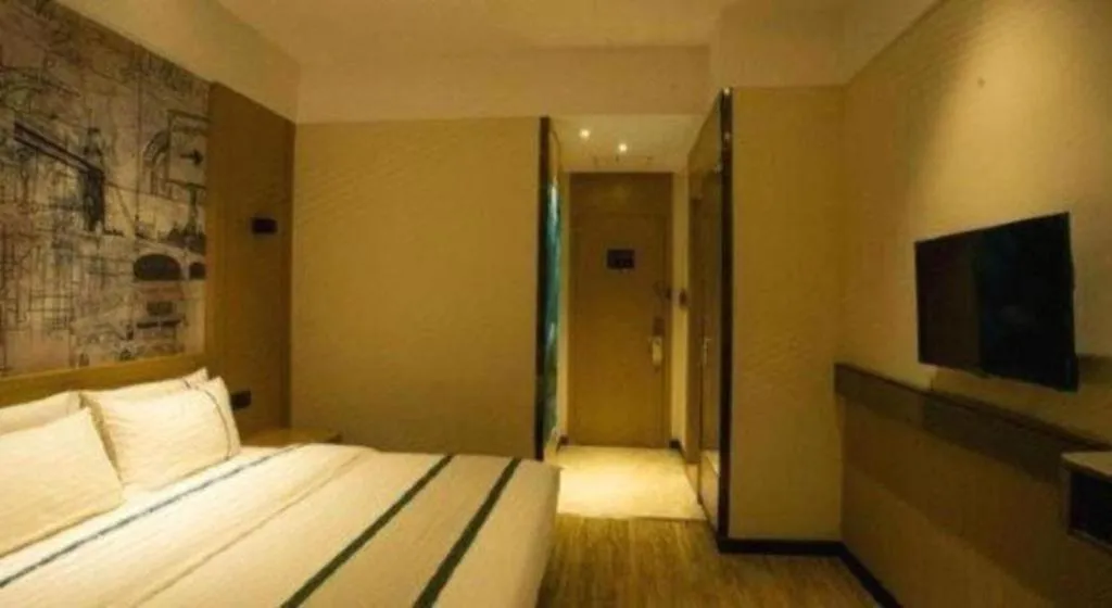 Bed in City Comfort Inn Huanggang Wuxue Bus Center