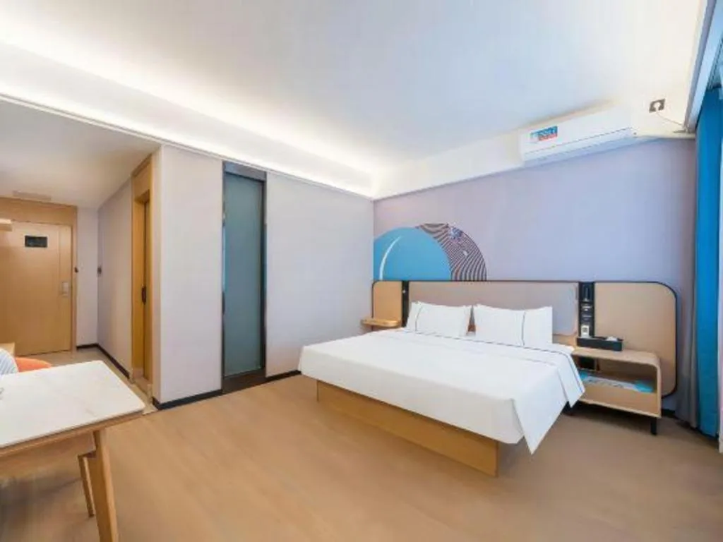 Bed in City Comfort Inn Huanggang Wuxue Bus Center