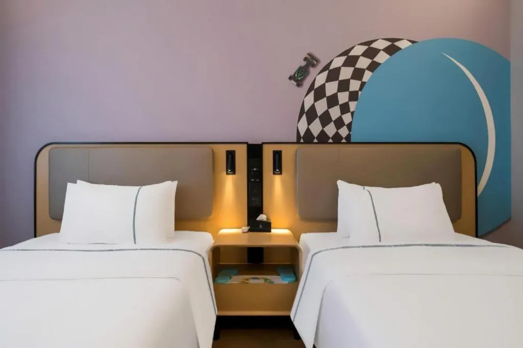 Bed in City Comfort Inn Huanggang Wuxue Bus Center