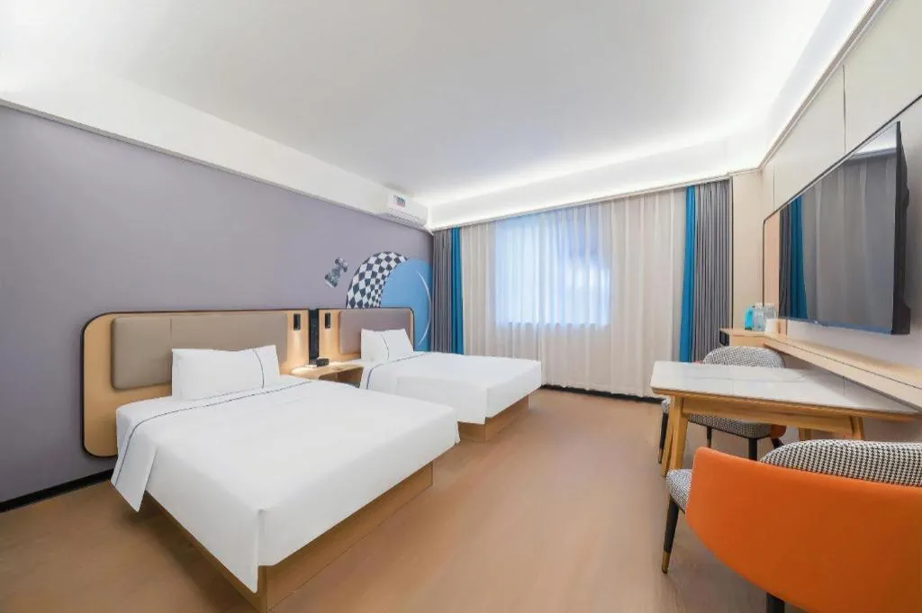 Bed in City Comfort Inn Huanggang Wuxue Bus Center