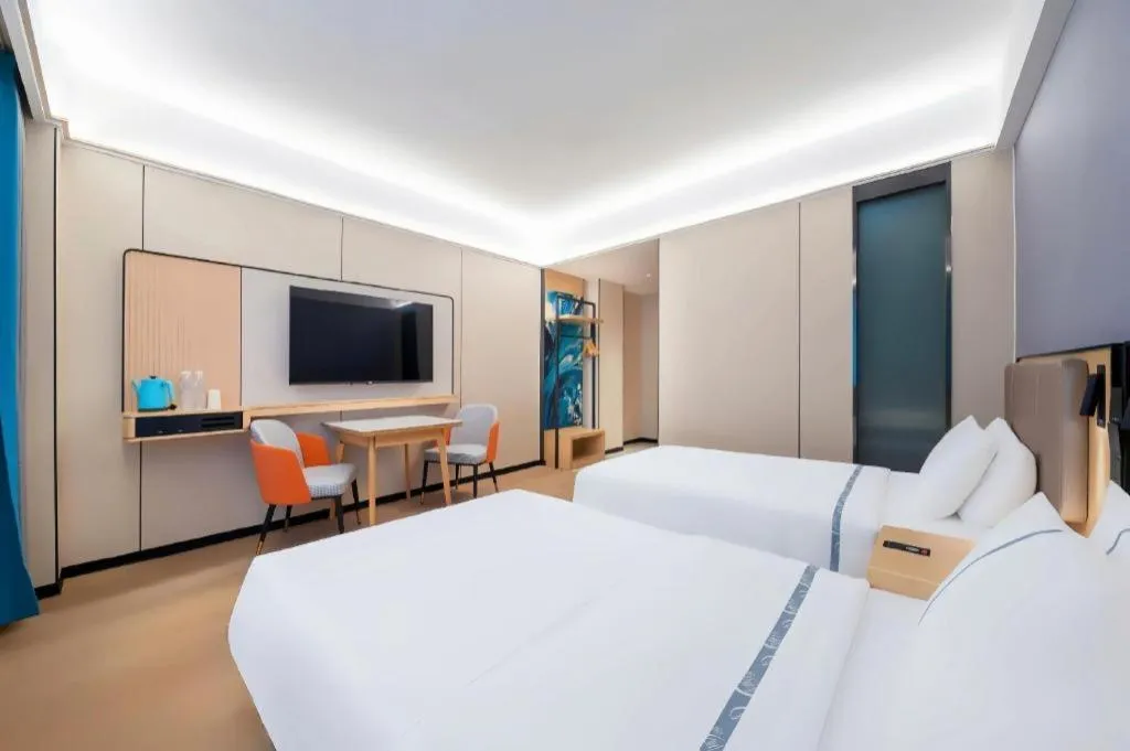 Bed in City Comfort Inn Huanggang Wuxue Bus Center