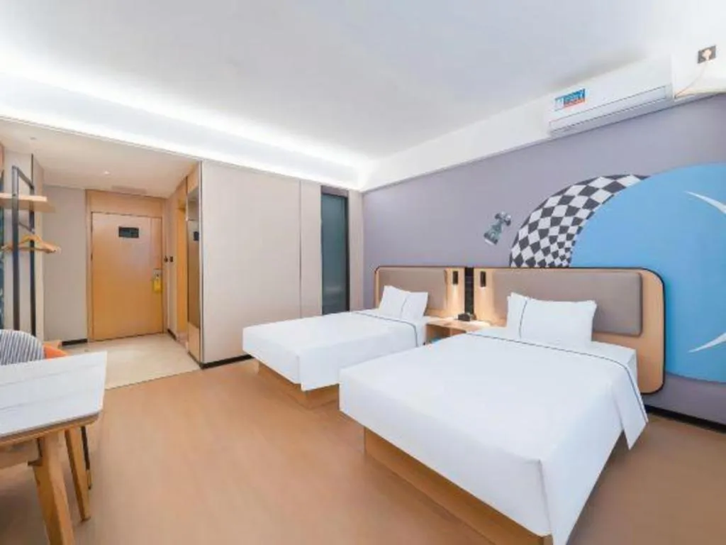 Bed in City Comfort Inn Huanggang Wuxue Bus Center