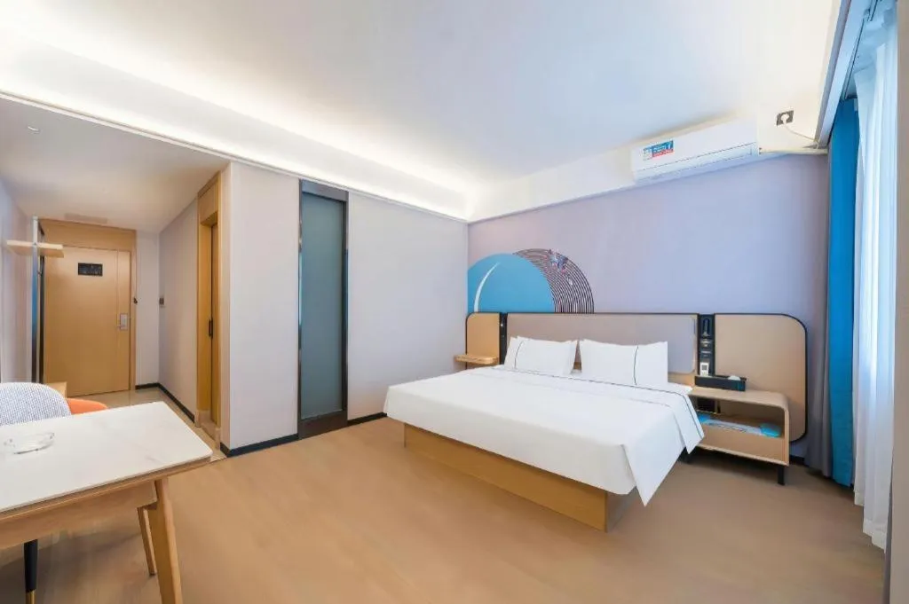 Bed in City Comfort Inn Huanggang Wuxue Bus Center