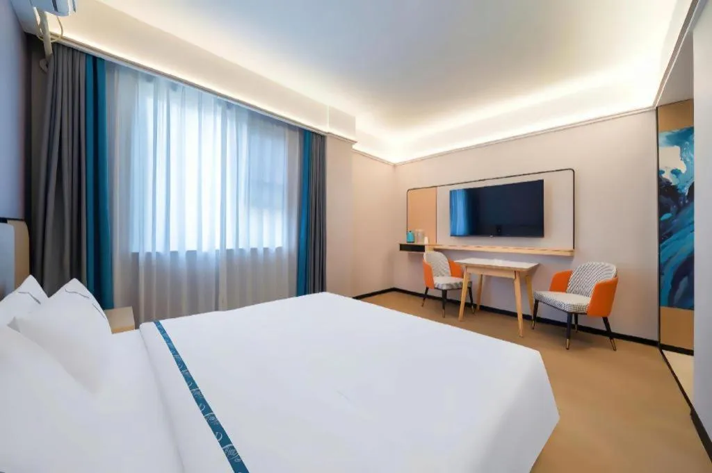 Bed in City Comfort Inn Huanggang Wuxue Bus Center