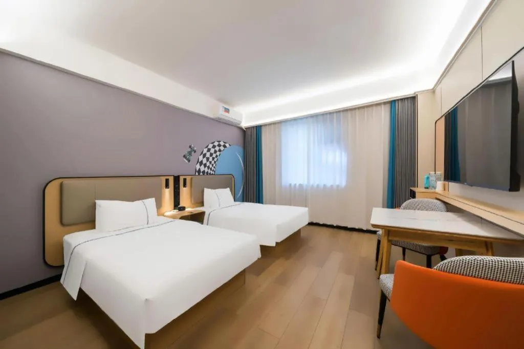 Bed in City Comfort Inn Huanggang Wuxue Bus Center