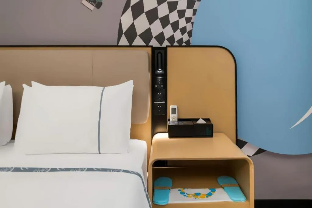 Bed in City Comfort Inn Huanggang Wuxue Bus Center