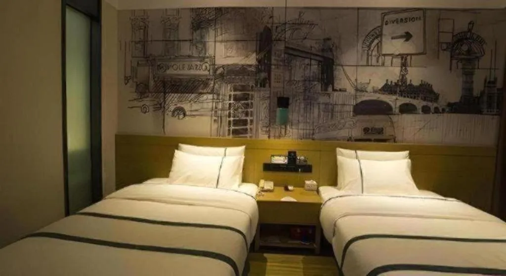 Bed in City Comfort Inn Huanggang Wuxue Bus Center