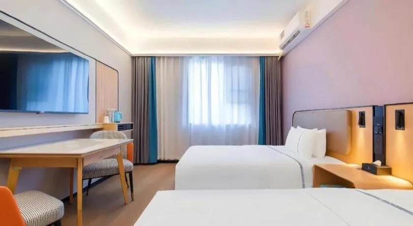 Bed in City Comfort Inn Huanggang Wuxue Bus Center