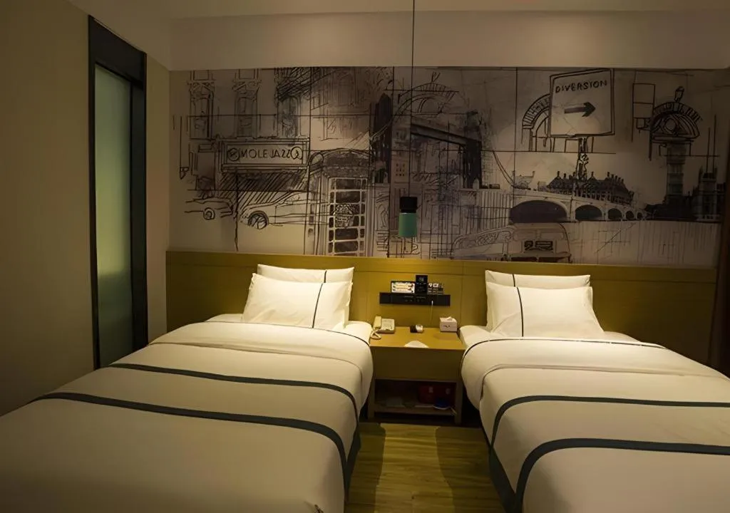 Bed in City Comfort Inn Huanggang Wuxue Bus Center