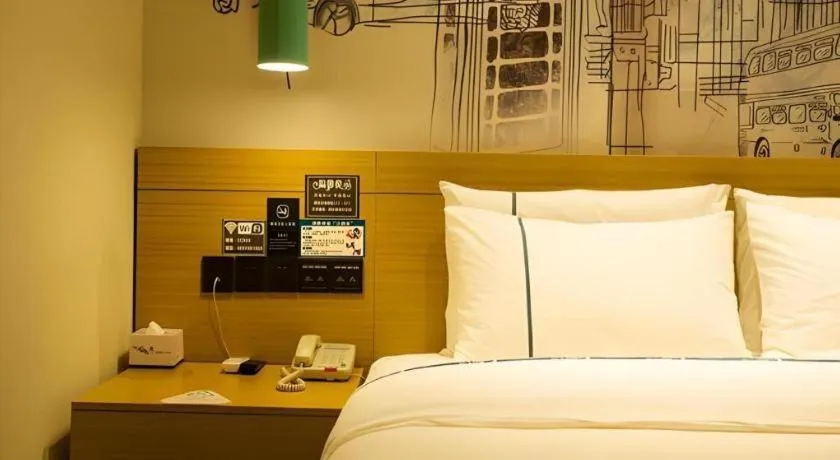 Bed in City Comfort Inn Huanggang Wuxue Bus Center