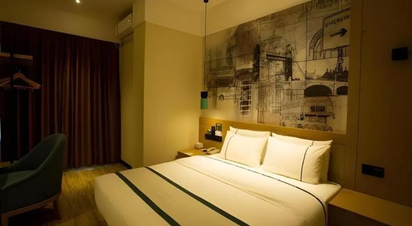 Bed in City Comfort Inn Huanggang Wuxue Bus Center