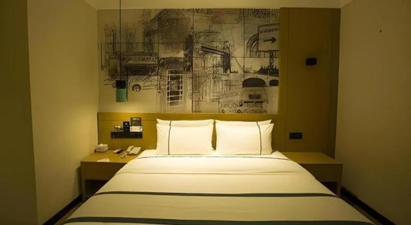 Bed in City Comfort Inn Huanggang Wuxue Bus Center