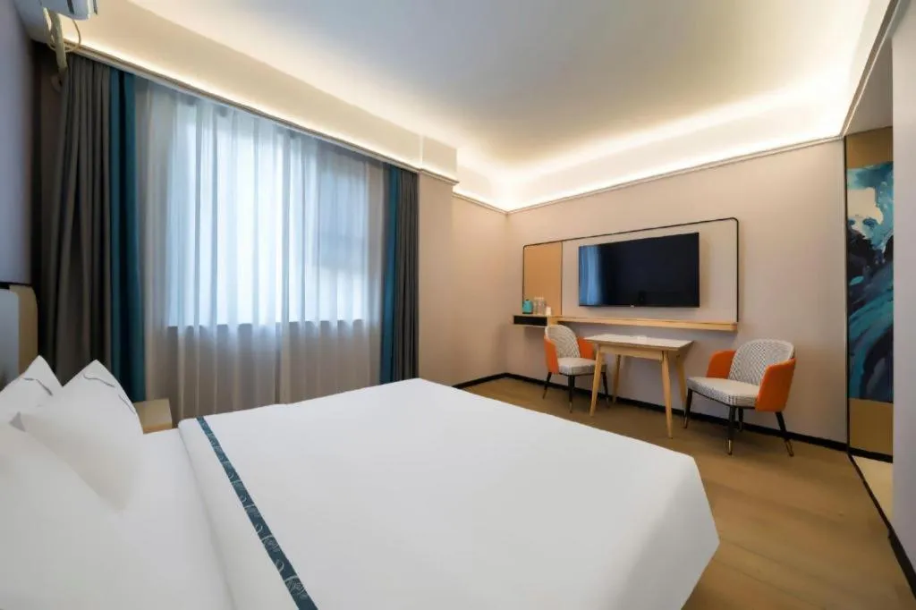 Bed in City Comfort Inn Huanggang Wuxue Bus Center