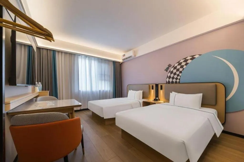 Bed in City Comfort Inn Huanggang Wuxue Bus Center