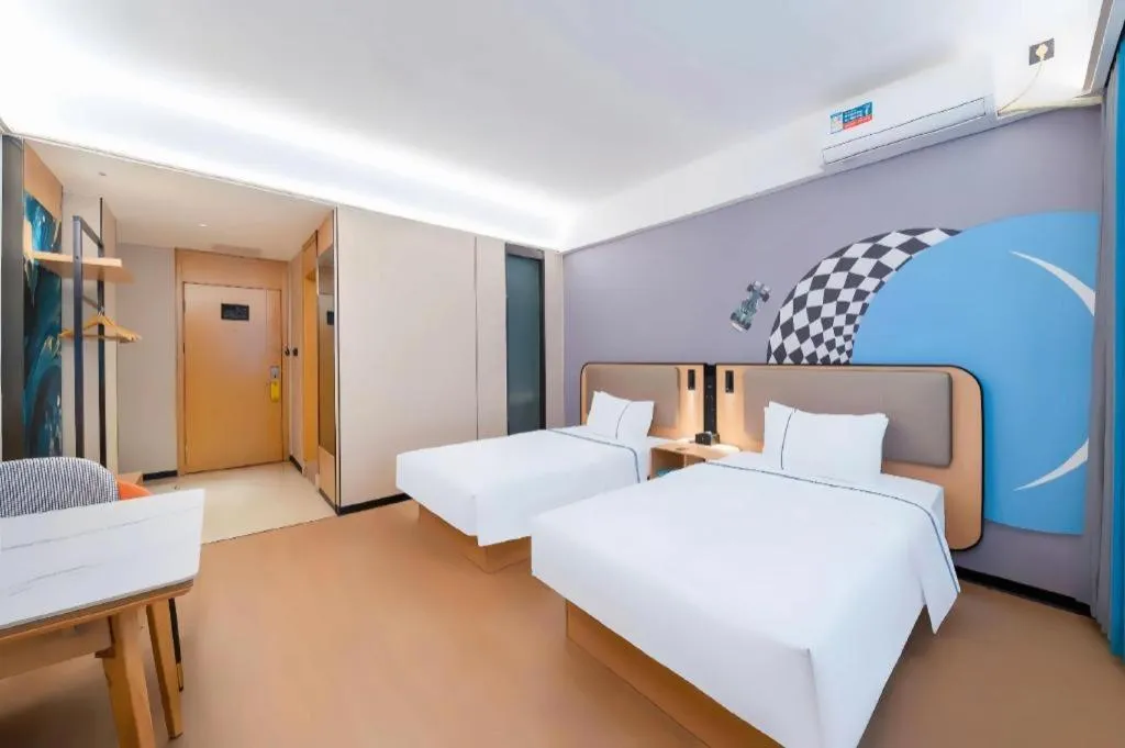 Bed in City Comfort Inn Huanggang Wuxue Bus Center