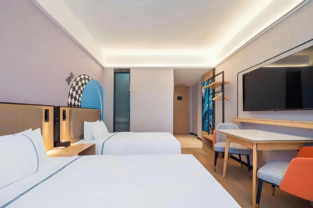 Bed in City Comfort Inn Huanggang Wuxue Bus Center