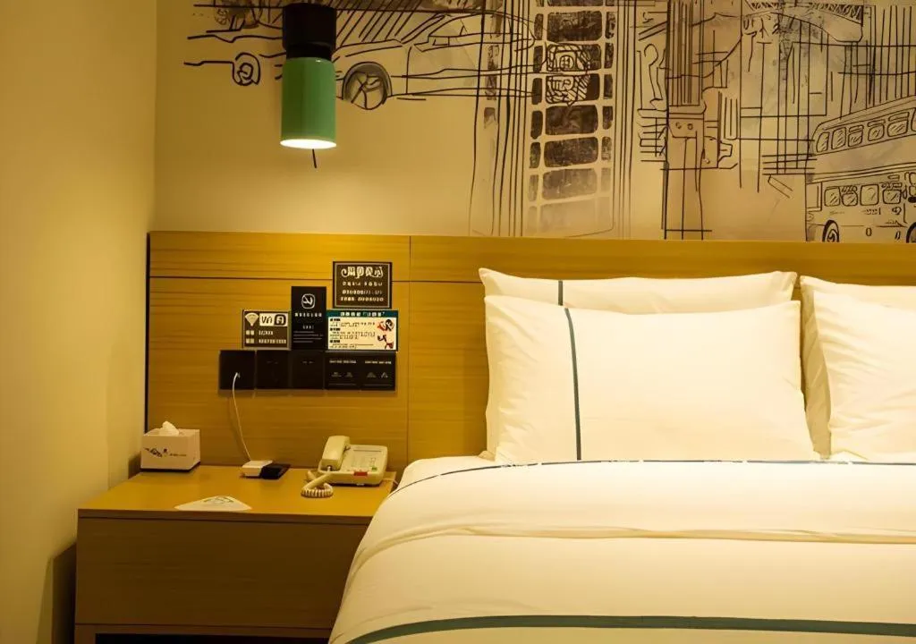 Bed in City Comfort Inn Huanggang Wuxue Bus Center