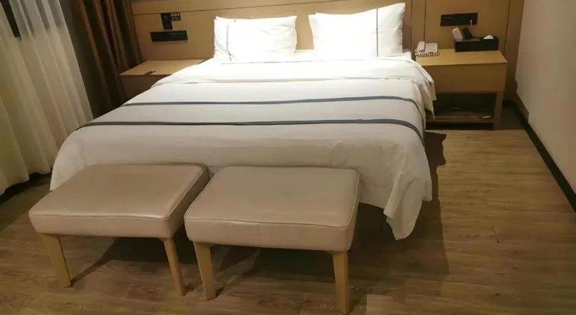 Bed in City Comfort Inn Huanggang Wuxue Bus Center