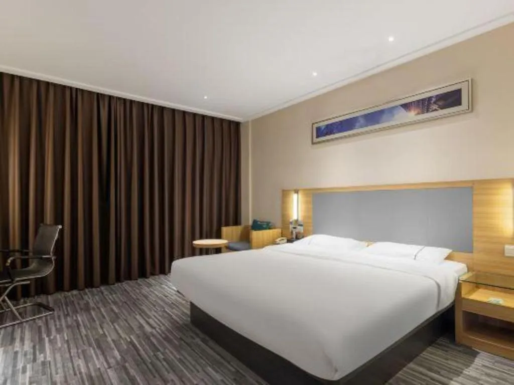 Bed in City Comfort Inn Zhanjiang Seaside Park Guanhai Corridor