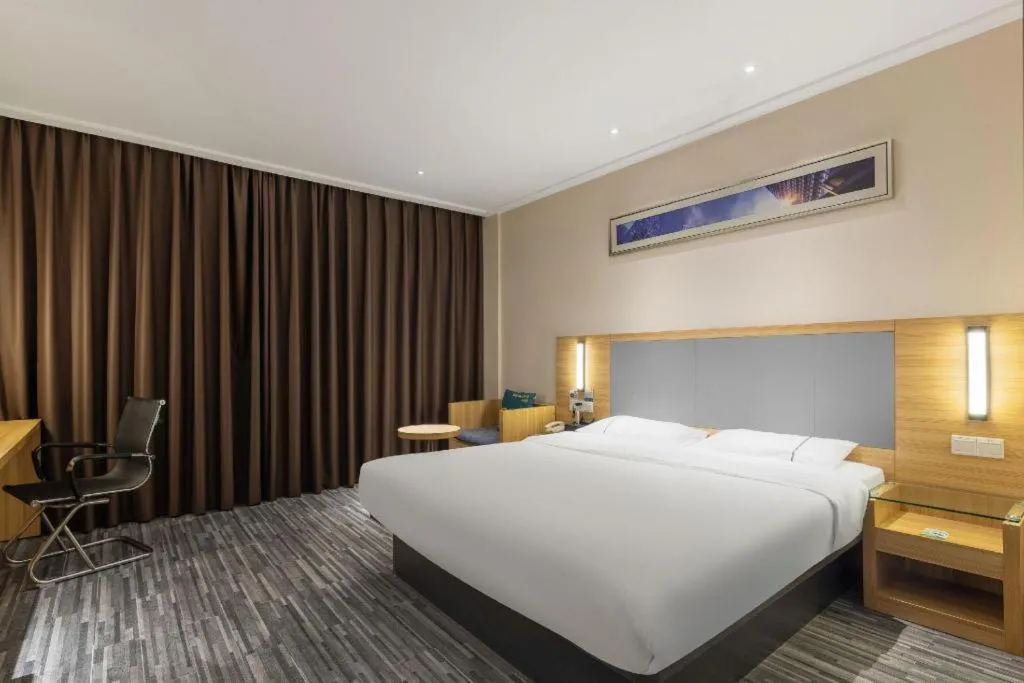Bed in City Comfort Inn Zhanjiang Seaside Park Guanhai Corridor