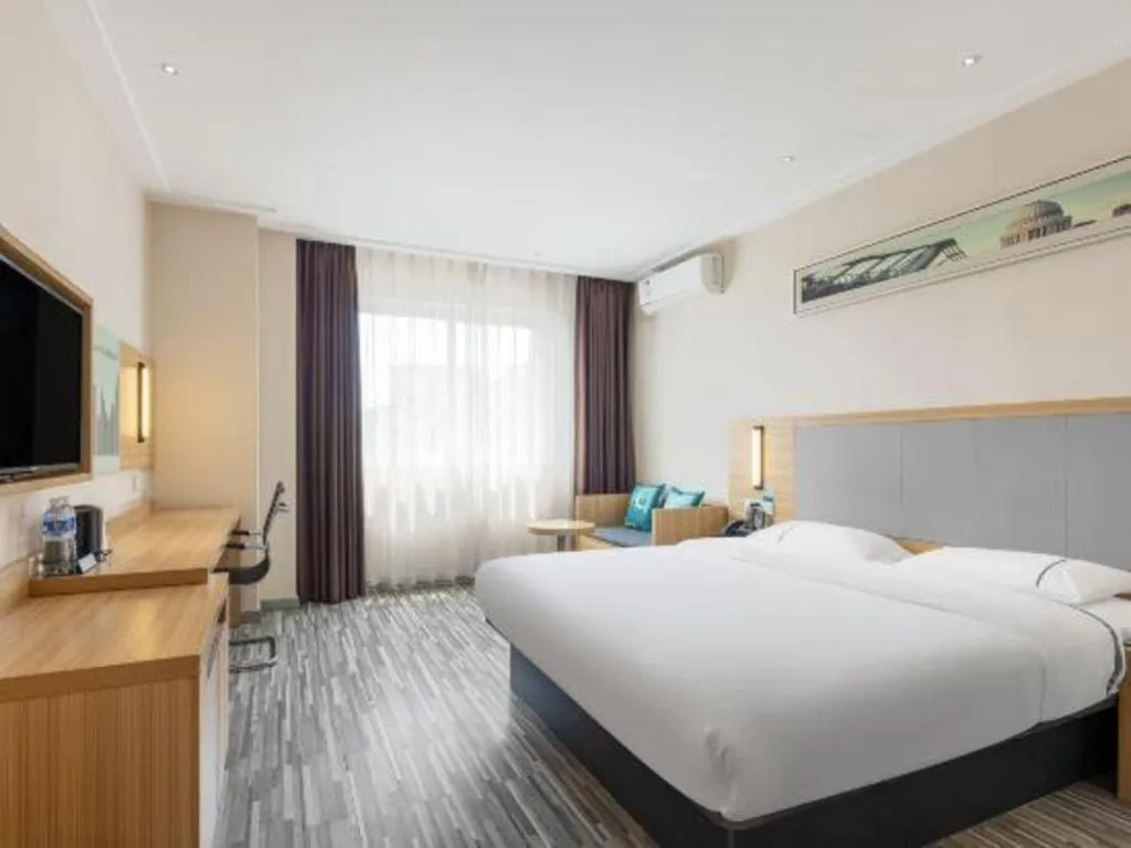 Bed in City Comfort Inn Zhanjiang Seaside Park Guanhai Corridor