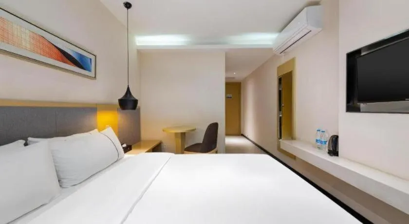Bed in City Comfort Inn Wuhan International Square Union Medical College Hospital