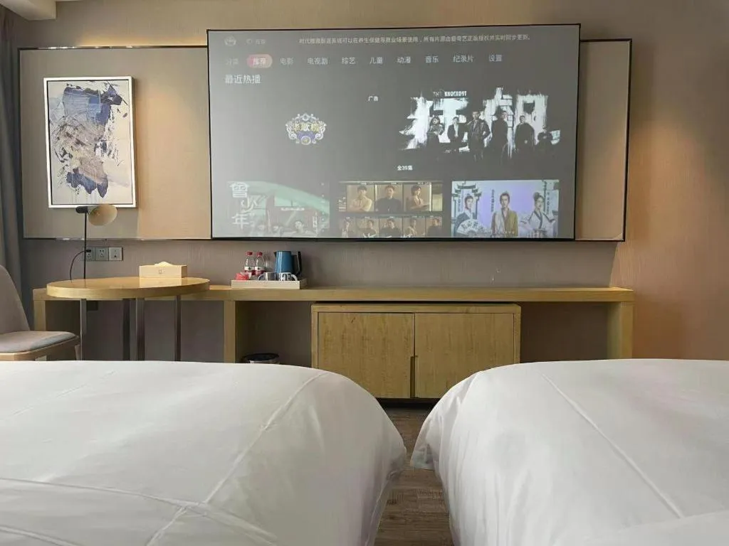 Bed in Echarm Hotel Huangshi Yingbin Avenue