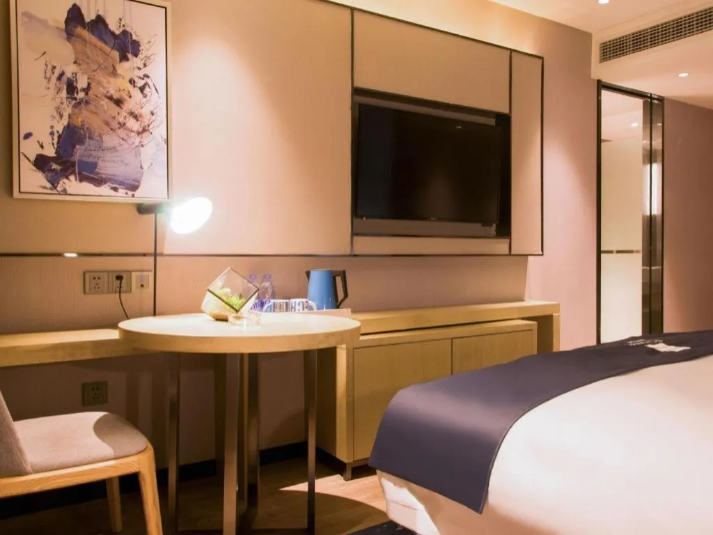 Bed in Echarm Hotel Huangshi Yingbin Avenue