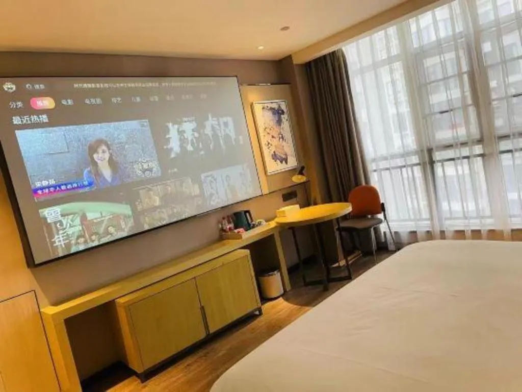 Bed in Echarm Hotel Huangshi Yingbin Avenue