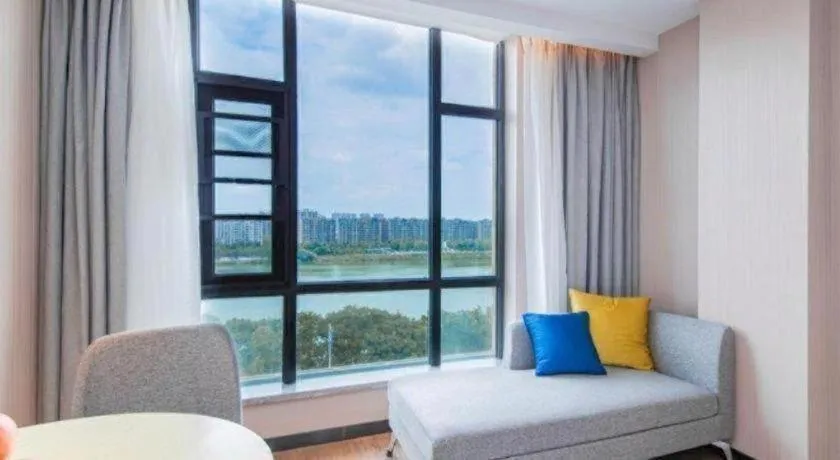 Bed in Echarm Hotel Huangshi Yingbin Avenue