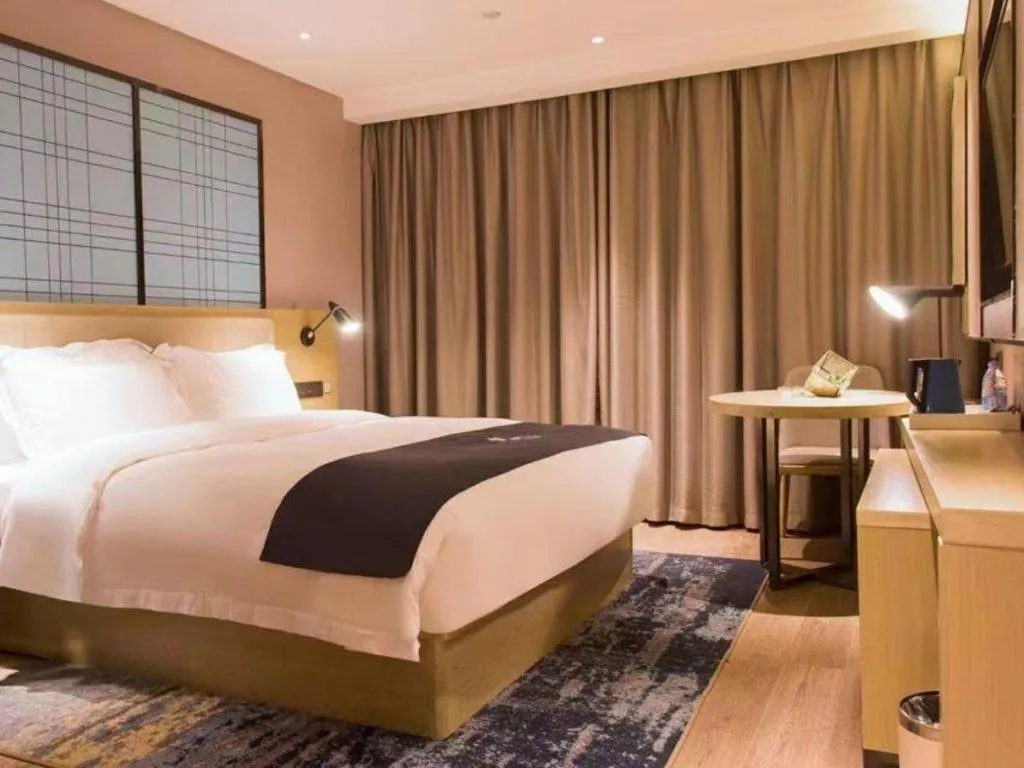 Bed in Echarm Hotel Huangshi Yingbin Avenue