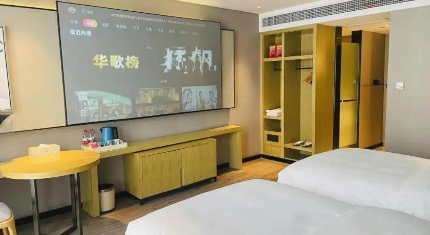 Bed in Echarm Hotel Huangshi Yingbin Avenue