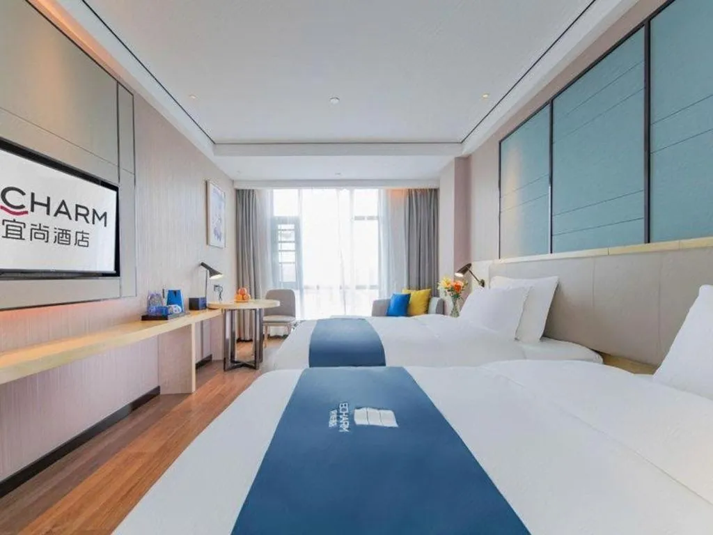 Bed in Echarm Hotel Huangshi Yingbin Avenue