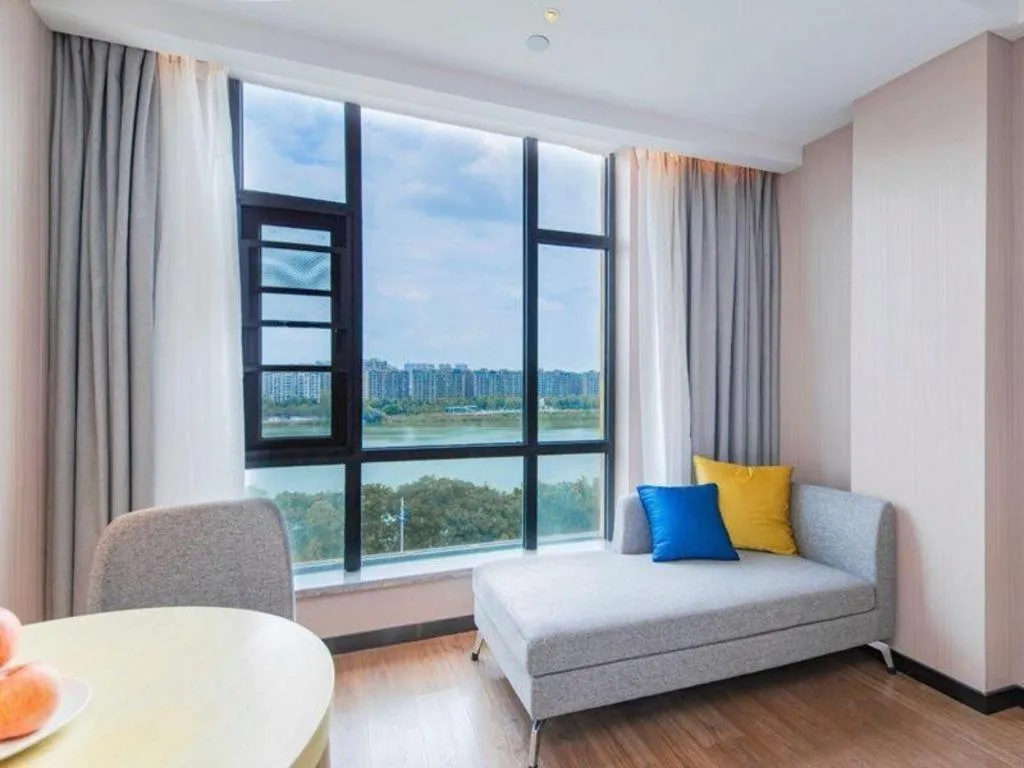 Bed in Echarm Hotel Huangshi Yingbin Avenue