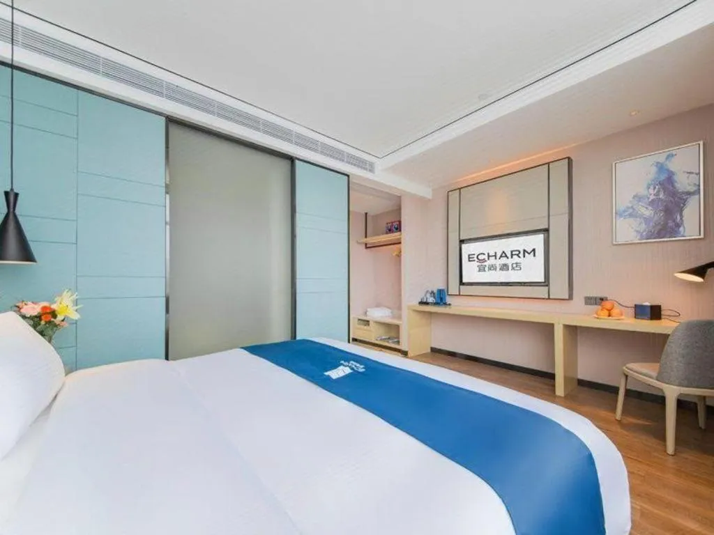 Bed in Echarm Hotel Huangshi Yingbin Avenue