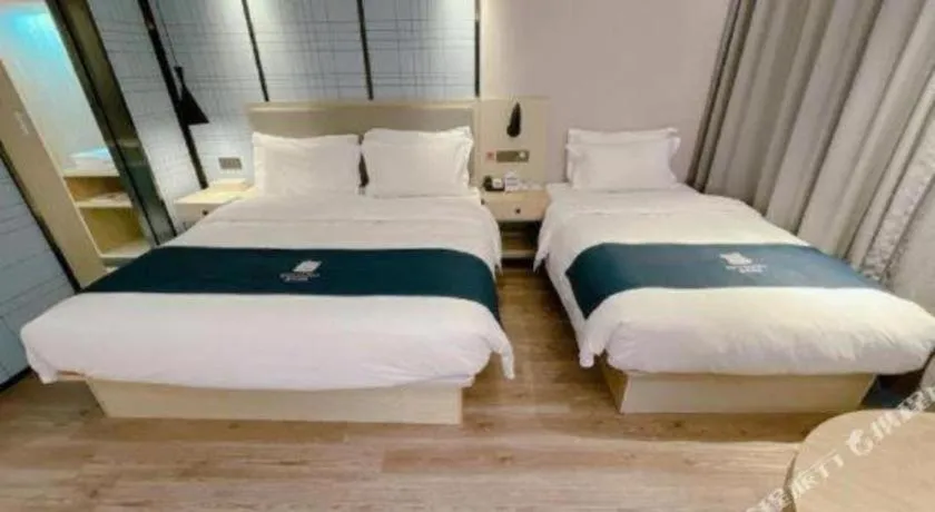 Bed in Echarm Hotel Changchun Jiutai District Government Railway Station