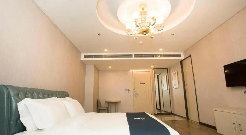 Bed in Echarm Hotel Changchun Jiutai District Government Railway Station