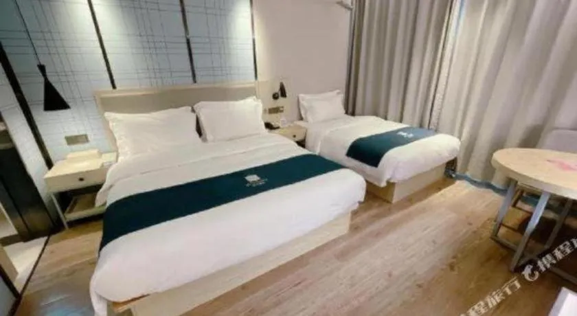 Bed in Echarm Hotel Changchun Jiutai District Government Railway Station