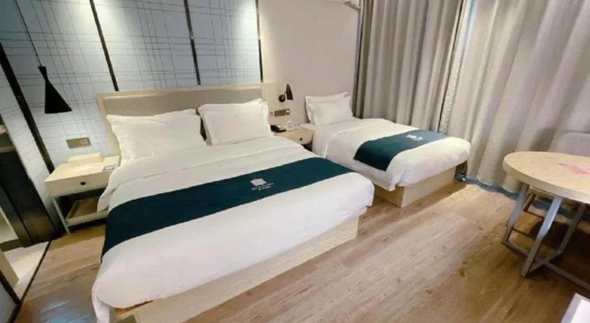 Bed in Echarm Hotel Changchun Jiutai District Government Railway Station