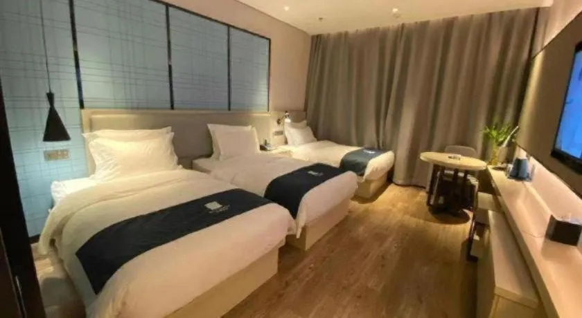 Bed in Echarm Hotel Changchun Jiutai District Government Railway Station