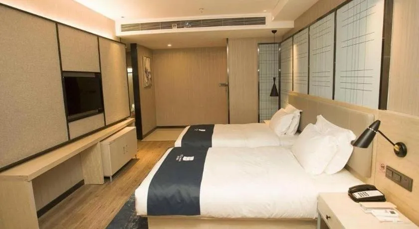 Bed in Echarm Hotel Changchun Jiutai District Government Railway Station