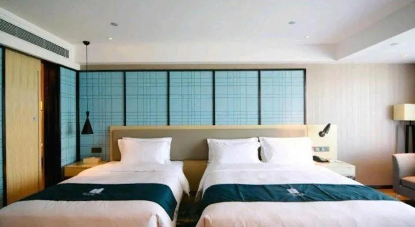 Bed in Echarm Hotel Changchun Jiutai District Government Railway Station