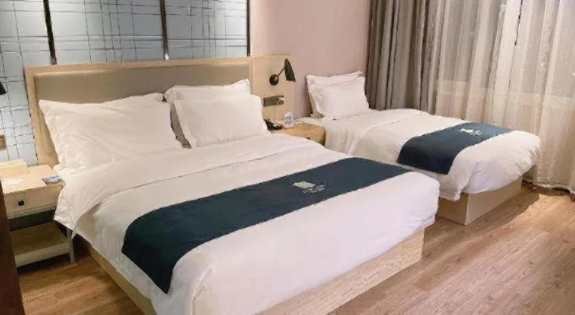 Bed in Echarm Hotel Changchun Jiutai District Government Railway Station