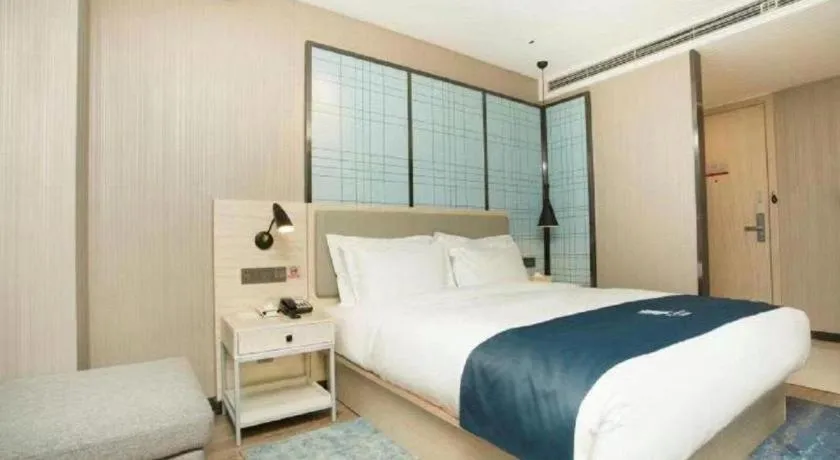 Bed in Echarm Hotel Changchun Jiutai District Government Railway Station