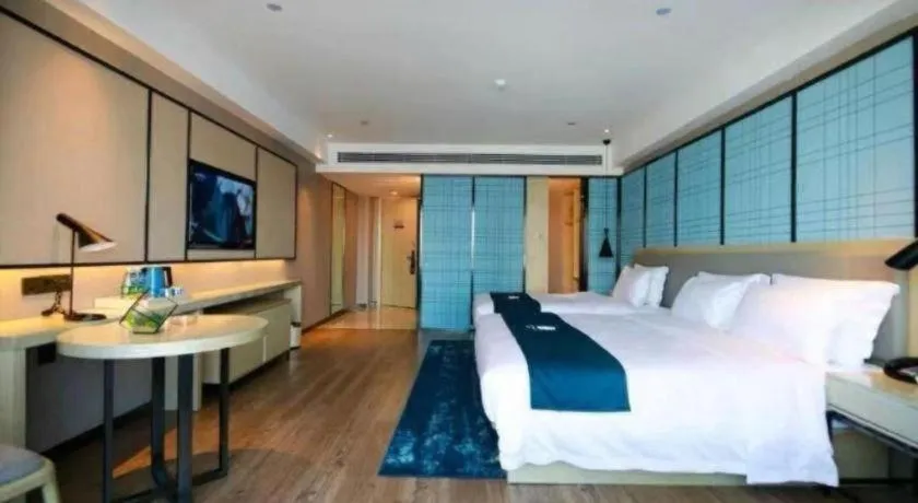 Bed in Echarm Hotel Changchun Jiutai District Government Railway Station