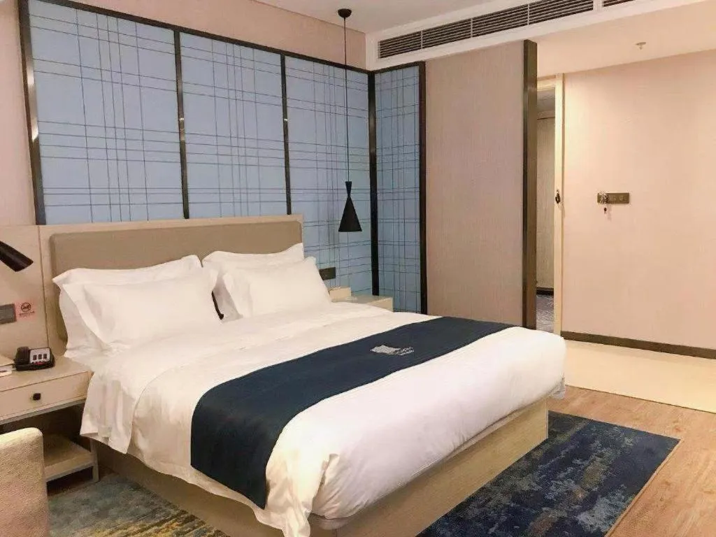 Bed in Echarm Hotel Changchun Jiutai District Government Railway Station
