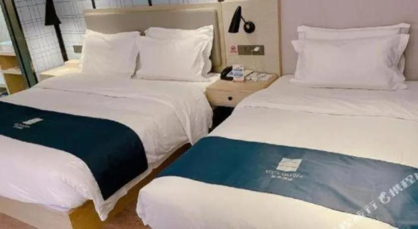 Bed in Echarm Hotel Changchun Jiutai District Government Railway Station