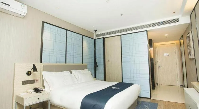 Bed in Echarm Hotel Changchun Jiutai District Government Railway Station