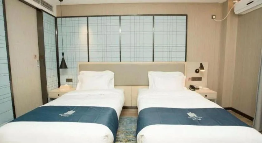 Bed in Echarm Hotel Changchun Jiutai District Government Railway Station